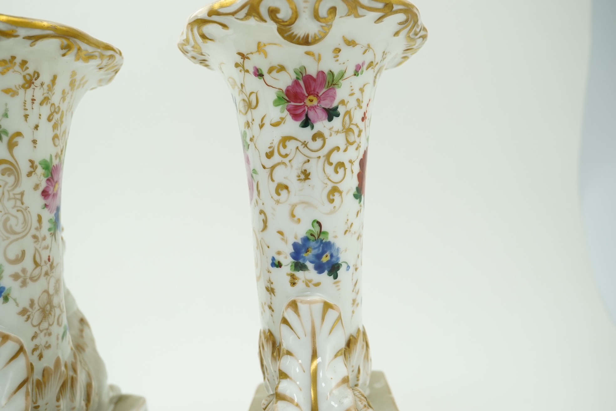 A pair of Paris porcelain cornucopia vases, mid 19th century